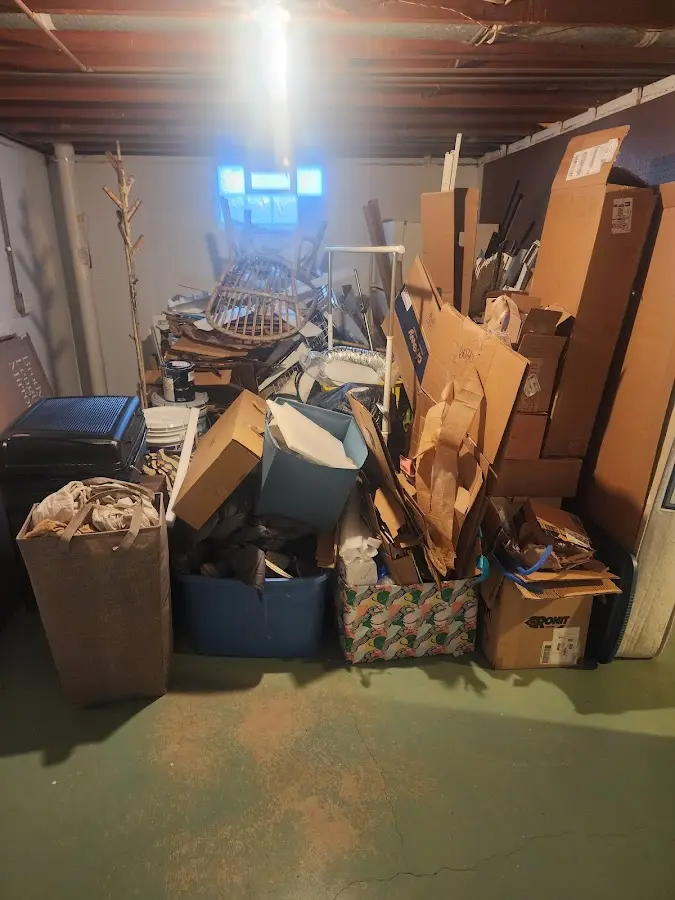 Roll-off dumpster container at job site for 2 Yard Dumpster Rental in Skidaway Island